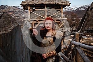 Viking woman in a traditional warrior clothes