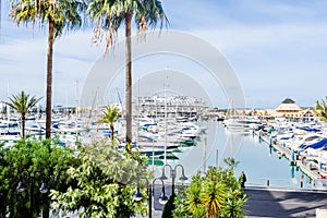 Vilamoura Marina, Portugal. Exclusive place surrounded by boats and luxury hotels photo