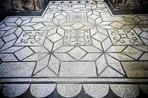 Villa Adriana. White and black mosaics with geometric motifsdecorate the floors of various environments. Rome, Italy