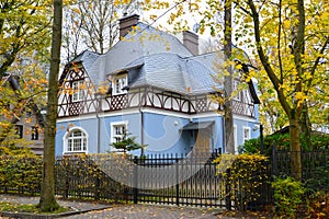 Villa with a blue facade on Dynamo street in an autumn day. Svetlogorsk, Kaliningrad region