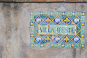 Villa d`Este sign on the wall, Tivoly, Italy.