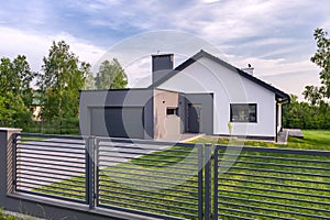 Villa with fence and garage