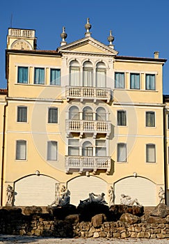 Villa with a fountain through the hills lit by the sun in the province of Padua in Veneto (Italy)