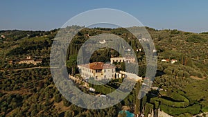 Villa on hill in tuscany. Top view of beautiful house and landscape.