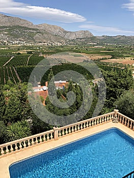 Villa Pool and mountain landscape near Orba, Spain