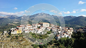 The village of Aieta in the middle of the green and arid countryside