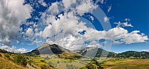 Village of Ancelle and the Autane mountain peaks in Summer. Hautes Alpes, France