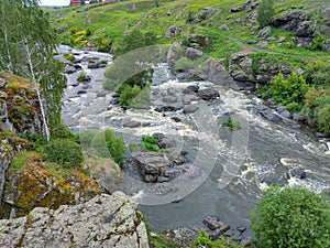 The village of Beklenishcheva, Kamensky city district, Sverdlovsk region, Russia - 06.13.2022. Howler threshold on the Iset River