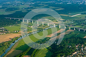 The village and the bridge over the river the view from the top of the troposphere photo