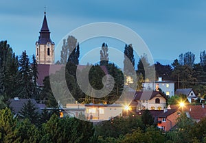 Village Budmerice at night with church, Slovakia