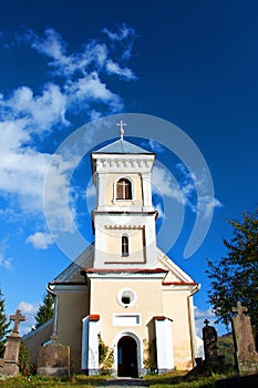 Village church with blue sky photo