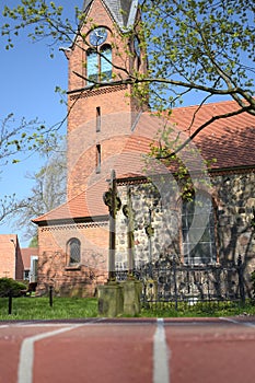 A village church near Berlin with weathered grave crosses