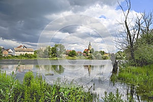 Village church under the stormy clouds