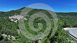 Village of Consegudes panoramic aerial view in french Alps