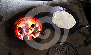 village country made earthen stove with red hot coal, ready to cook chappati and roti
