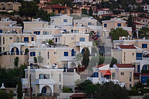 Village in Cyprus. Cottages in Cyprus city from a bird's eye view. Resort town at foot of the mountain. Rest in city photo