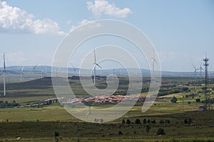 The village deep in the Zhangbei grassland under the blue sky and white clouds