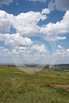 The village deep in the Zhangbei grassland under the blue sky and white clouds