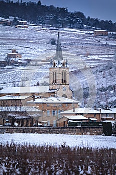 Village of Denice and landscape of Beaujolais under the snow