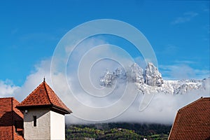 village of Duingt in the Alps, snow-capped mountain in background