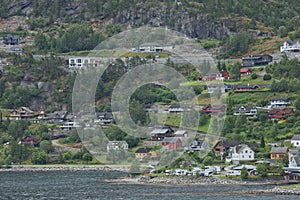 The village of Eidfjord in Norway is a major cruise ship port of call. It is situated at the end of the Eid Fjord, an inner branch