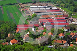 Village with farm on aerial view