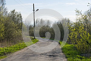 Village flattering road going into the distance photo