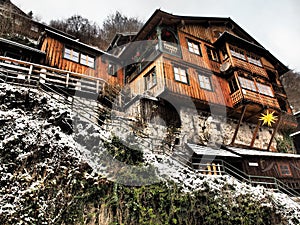 The village of Hallstatt, Austria, covered with snow in the winter time just before Christmas photo