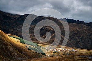 Village on hill of Greater Caucasus Mountains, Kazbegi, Georgia