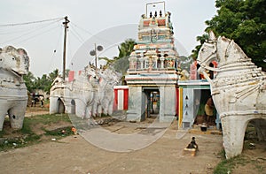 Village hindu temple in India with clay horses