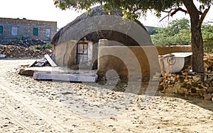 Adobe hut in desert village Khari, Thar Desert in Rajasthan, India