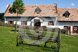 Village house with rake