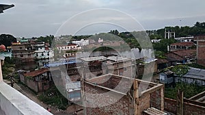 Village houses road and covered by green trees India Bihar