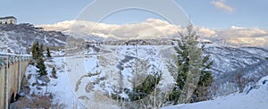 Village with huge houses on top of a snowy mountain at Draper, Utah with Wasatch mountain view