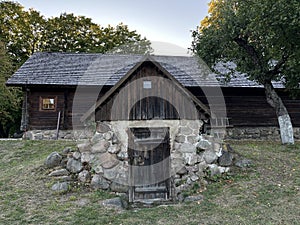 Village hut. Barn. Old house. Cellar. Door to the basement