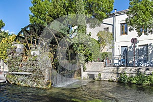 Village of L`Isle sur la Sorgue in Provence, France photo