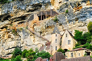Village La Roque Gageac, France. Stairway to the cave on the mountain side.