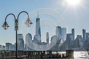 Village lighting with New York skyline in background