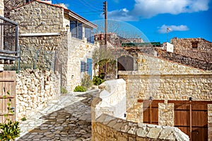 Village of Lofou, traditional stone houses obbled stone street.