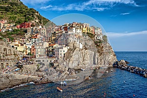 Village Manarola during summer time in Cinq Terre, Italy photo