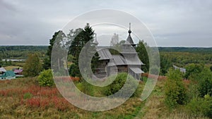 Village of Manga in Karelia, on a hill, there is a wooden chapel of Nativity of the Virgin built in the 18th century, view from ab