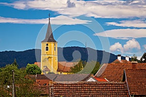 Village of Miholec church tower and Kalnik