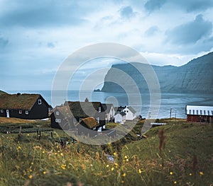 Village of Mikladalur located on the island of Kalsoy, Faroe Islands, Denmark photo