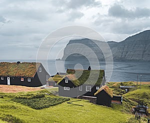 Village of Mikladalur located on the island of Kalsoy, Faroe Islands, Denmark photo