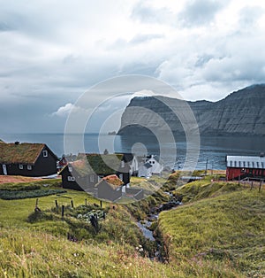 Village of Mikladalur located on the island of Kalsoy, Faroe Islands, Denmark photo