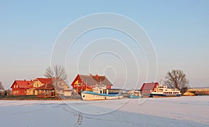 Village Minge in winter , Lithuania