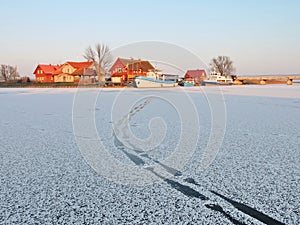 Village Minge in winter , Lithuania