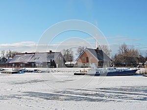 Village Minge in winter , Lithuania