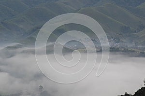 Village in the mist in the winter.