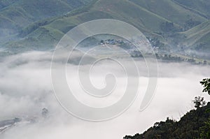 Village in the mist in the winter.